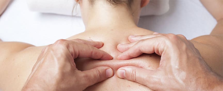 A massage therapist performing Myofascial Release Therapy